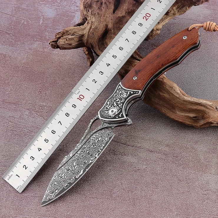 Meteor Engraved Damascus Steel Pocket Knife with Exotic Red Sandal Wood Handle
